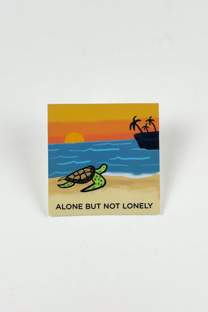 Square sticker showing an illustrated turtle on a beach, looking out over the ocean at sunset. 