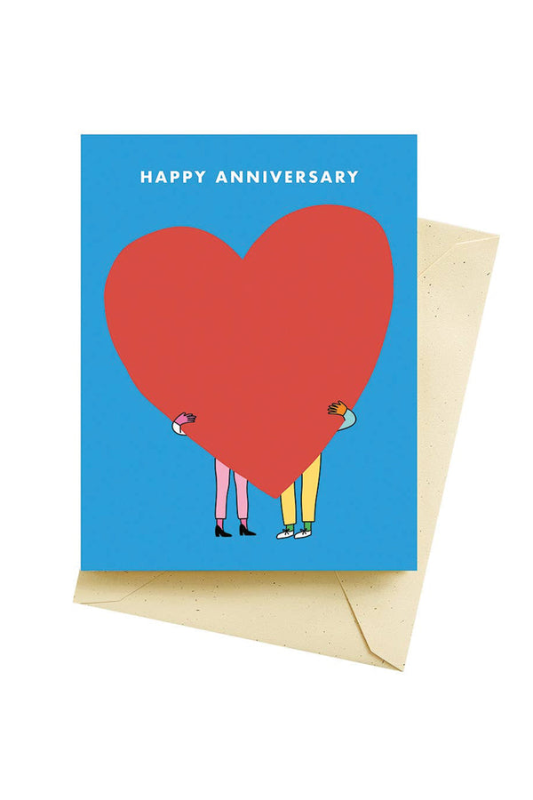 A blue greeting card with an image of a large red heart. Text reads "Happy Anniversary."