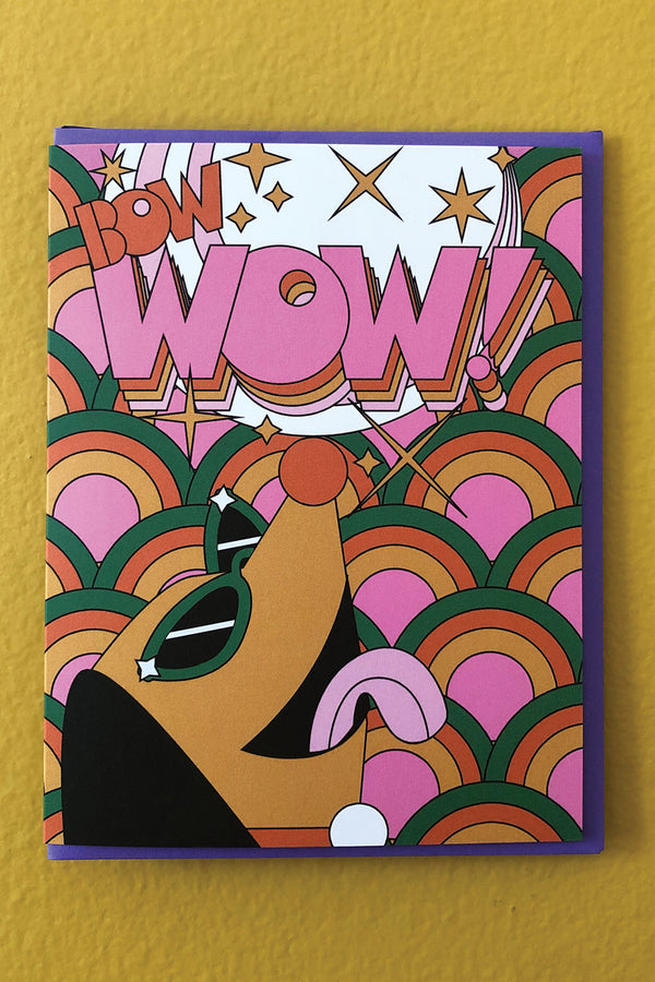 A colorful 70s-style greeting card with rainbows and a dog wearing sunglasses. Card reads "bow wow!"