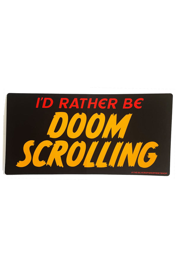 A black rectangular bumper sticker that reads "I'd rather be doom scrolling" in bold yellow and red text.