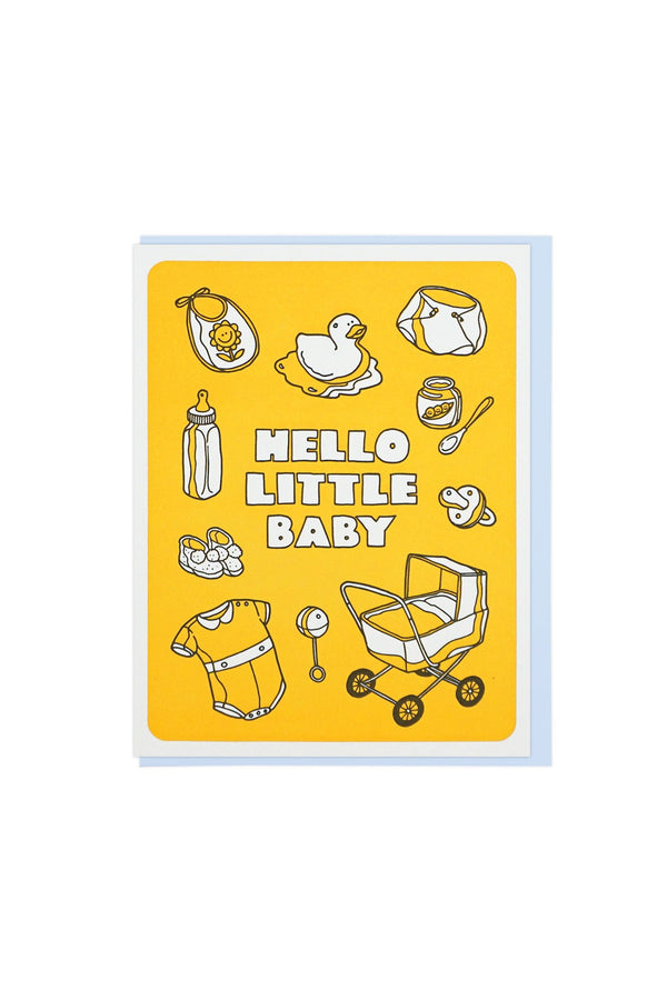 A yellow greeting card with illustrations of a stroller, onesie, rattle, bib, rubber duckie, and pacifier. The text in the center reads "Hello little baby."