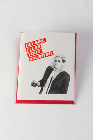 A white greeting card with an image of Kristen Stewart and red block text that reads "Hey girl, I'll be your valentine."