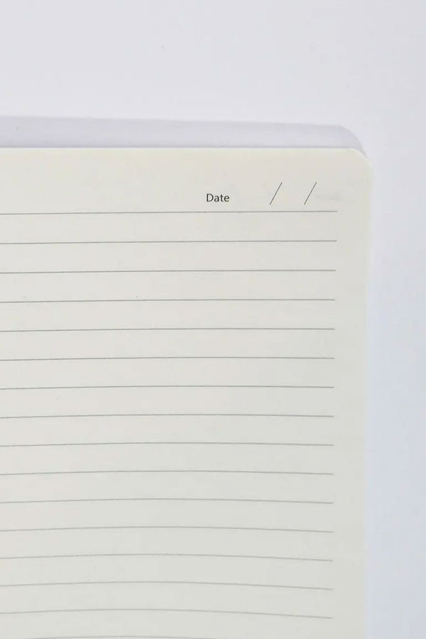 Lined Journal page against a white background. The page has thin lines from top to bottom and there a space at the top that says "DATE" with a space to enter the date.
