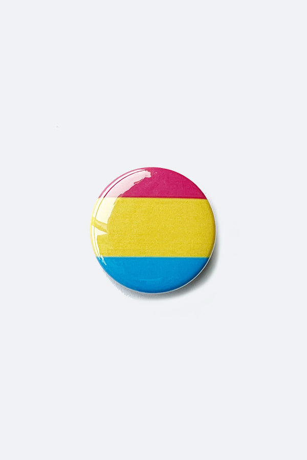 Pansexual flag button on a white background. The colors represented are three stripes starting with Pink at the top, followed by yellow and then blue.