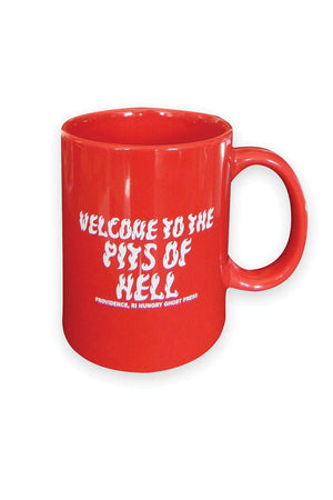 A red mug sitting on a white background. The white text that looks like flames reads "Welcome to the pits of hell."