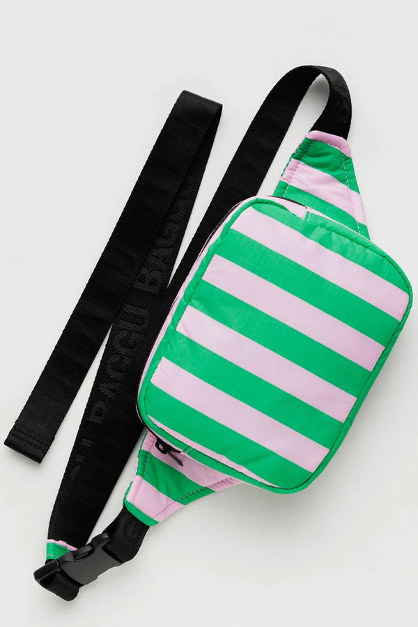 Puffy nylon fanny pack with black straps against a white background. The fanny pack has a green and lilac stripe vertical pattern across it. 