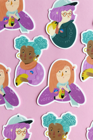 Several "voter girl" stickers are arranged on a light pink background. Each voter girl is holding a taco and wearing an "I voted" sticker on their clothing. 